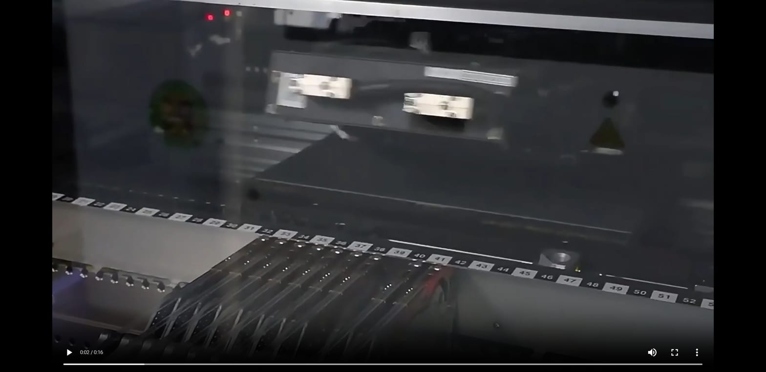 Close-up of Hanwha Decan SMT machine head placing LED components